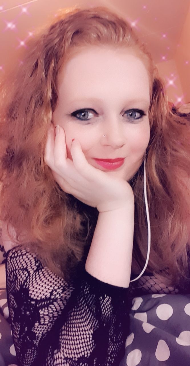 Sexy Redhead Milf's avatar