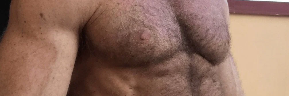 fist-muscle-stud profile banner